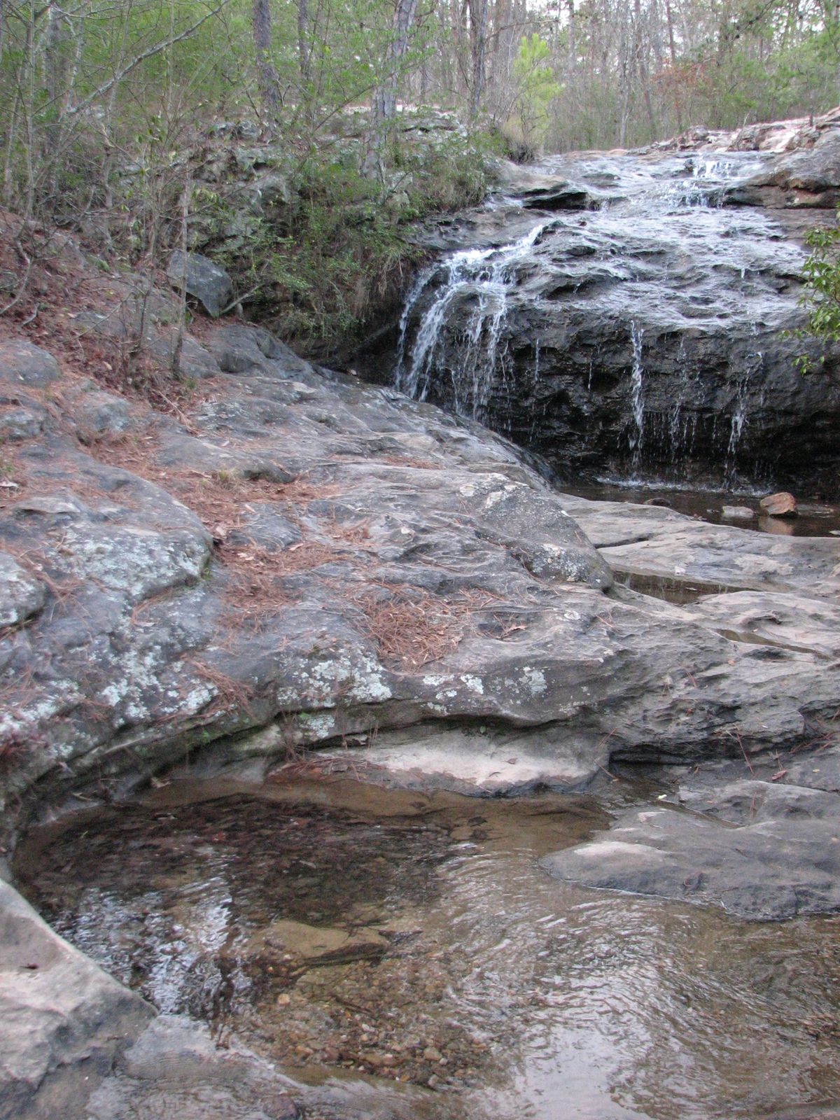 A small waterfall over sandstone at Moss Rock Preserve in Hoover