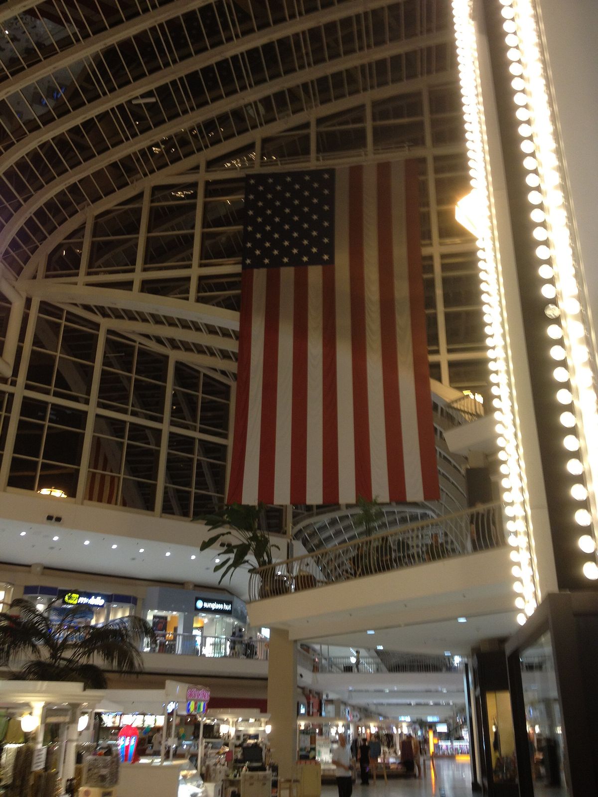 Inside the Riverchase Galleria in Hoover, with an American flag hanging below the glass roof