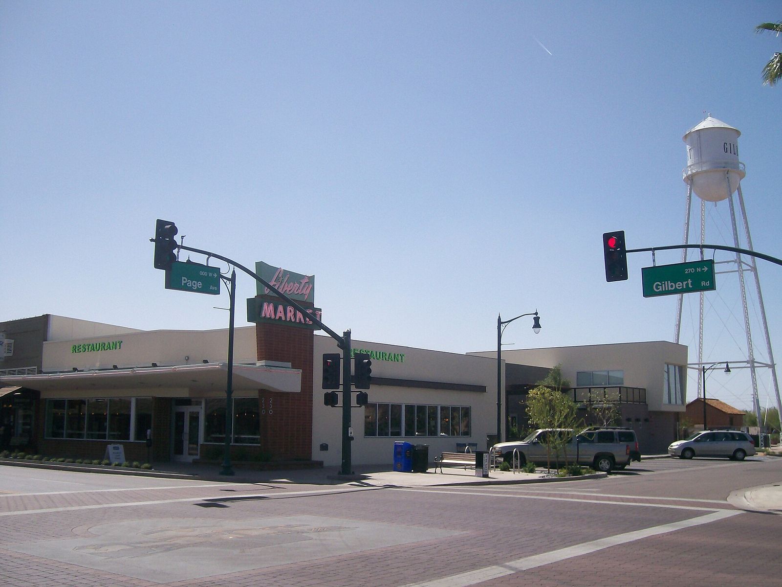 Downtown Gilbert at Gilbert Road and Page Avenue, with the town's white water tower rising behind the shops