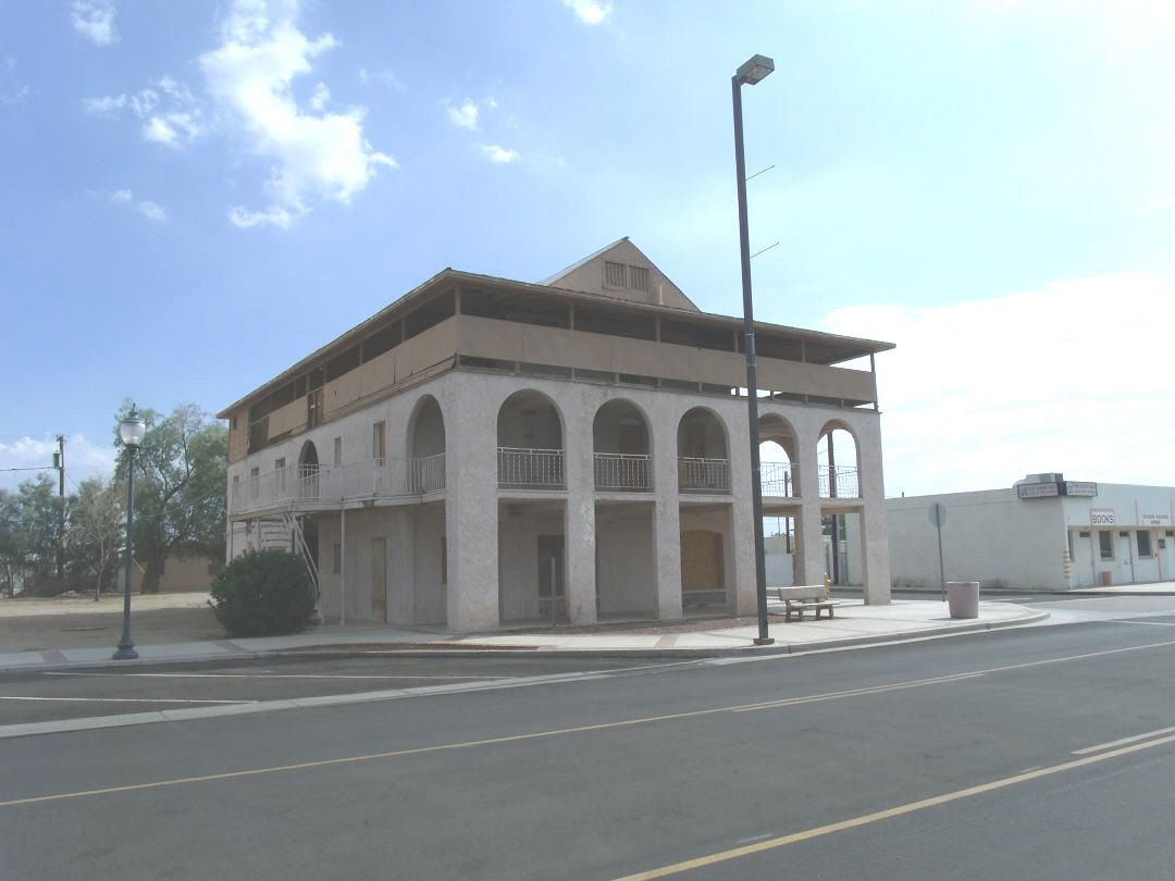 The historic two-story Edwards Hotel, built in 1918 with arched porches, on Washington Street in Peoria