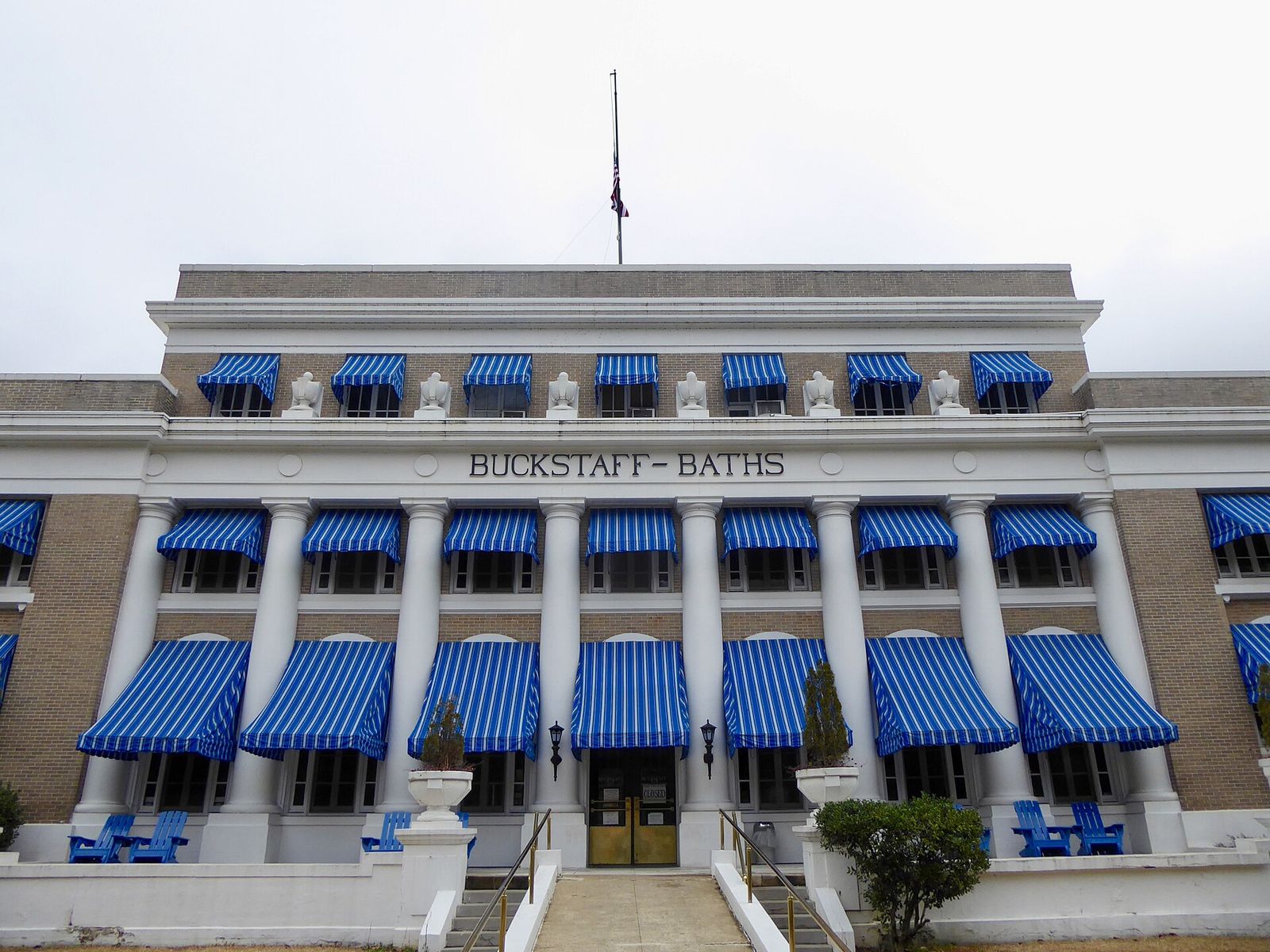 The Buckstaff Bathhouse on Bathhouse Row in Hot Springs, with its blue striped awnings