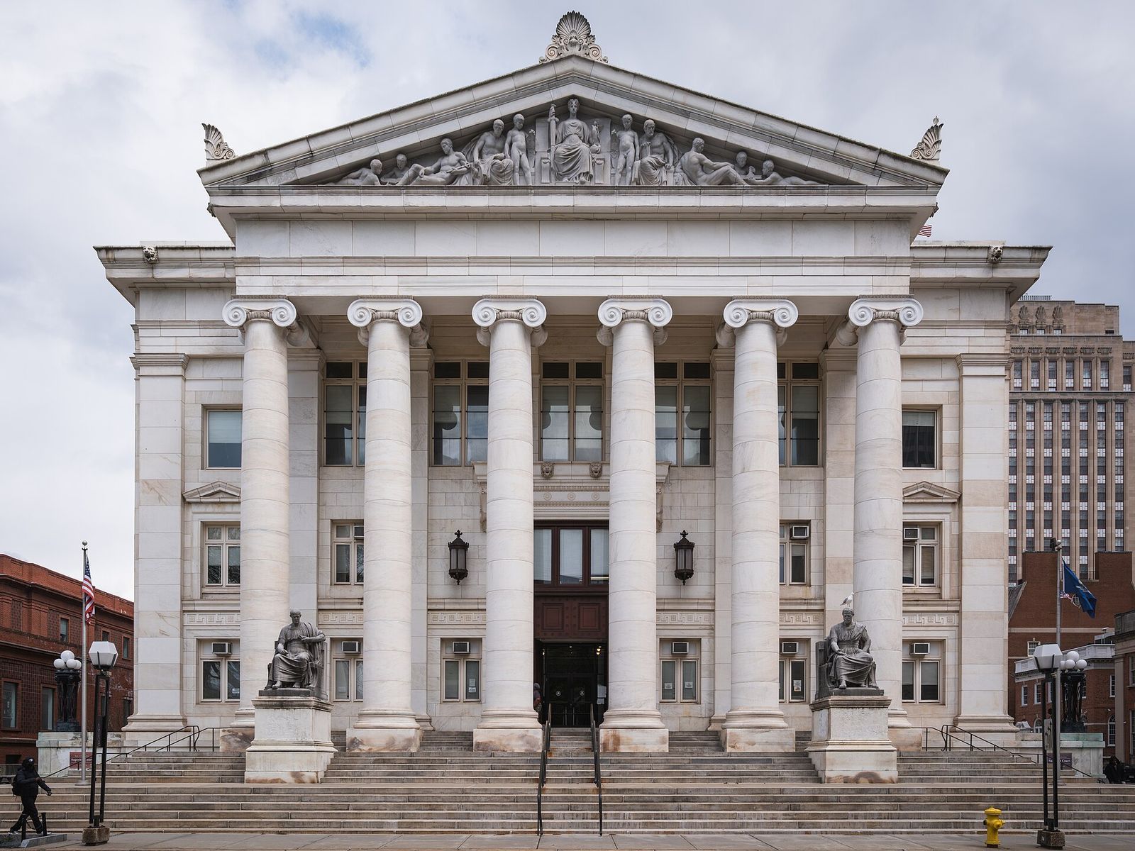 The Beaux-Arts facade of the New Haven County Courthouse, with its Ionic colonnade and sculpted pediment, facing the New Haven Green