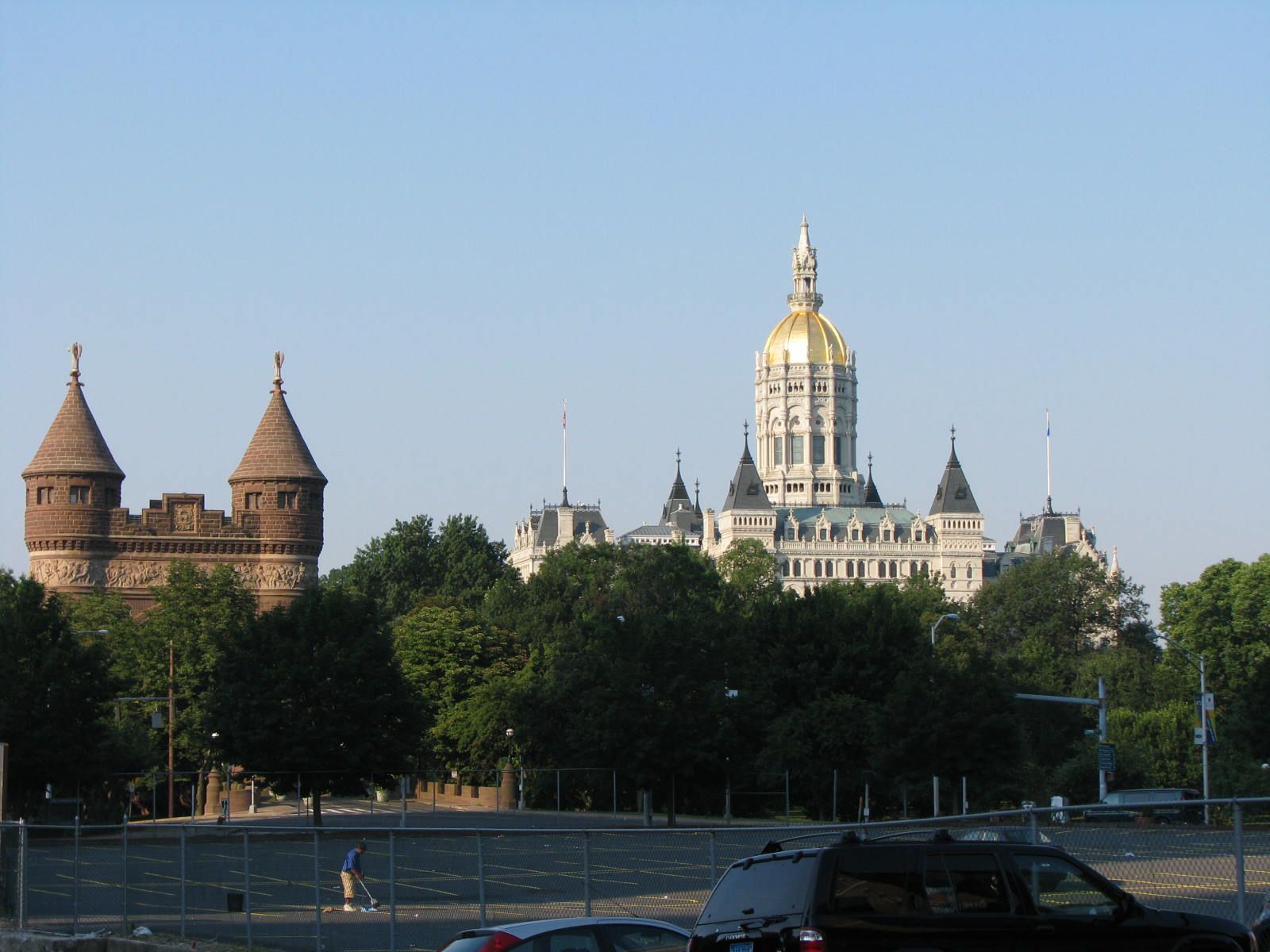 The gold-domed Connecticut State Capitol above the trees of Bushnell Park in Hartford