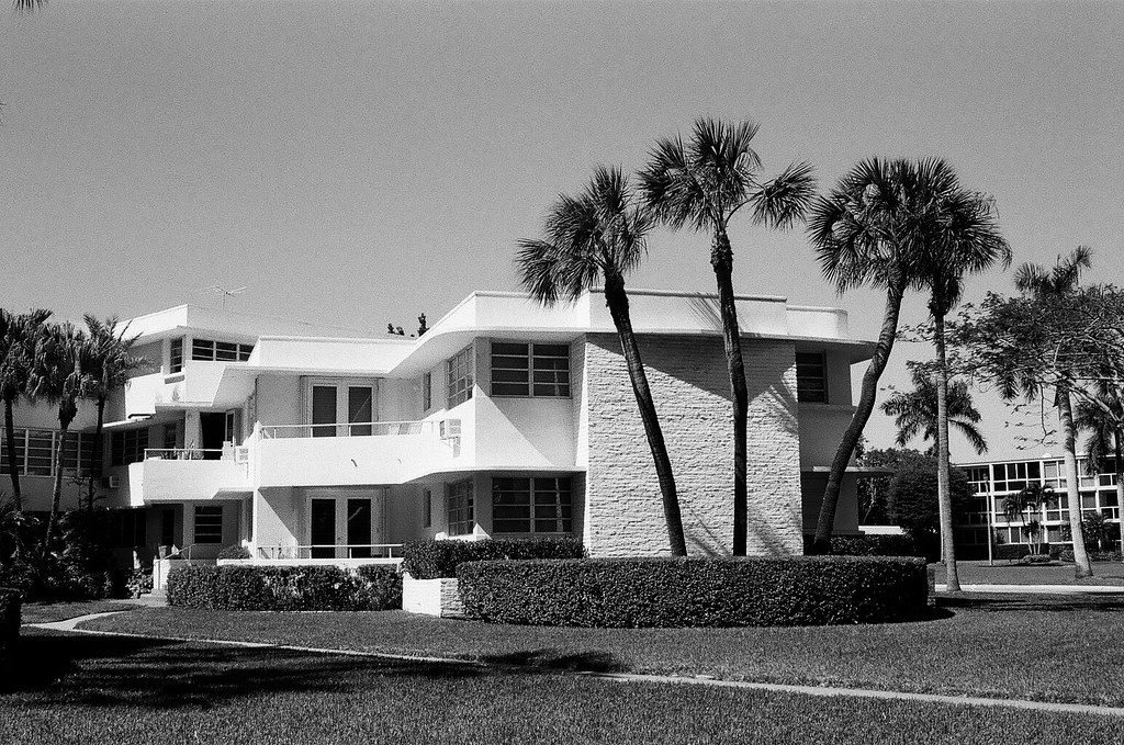 A black and white view of a midcentury apartment building in Florida