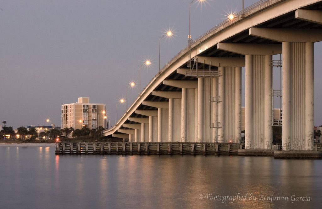 The Clearwater causeway bridge lit up over the water at dusk