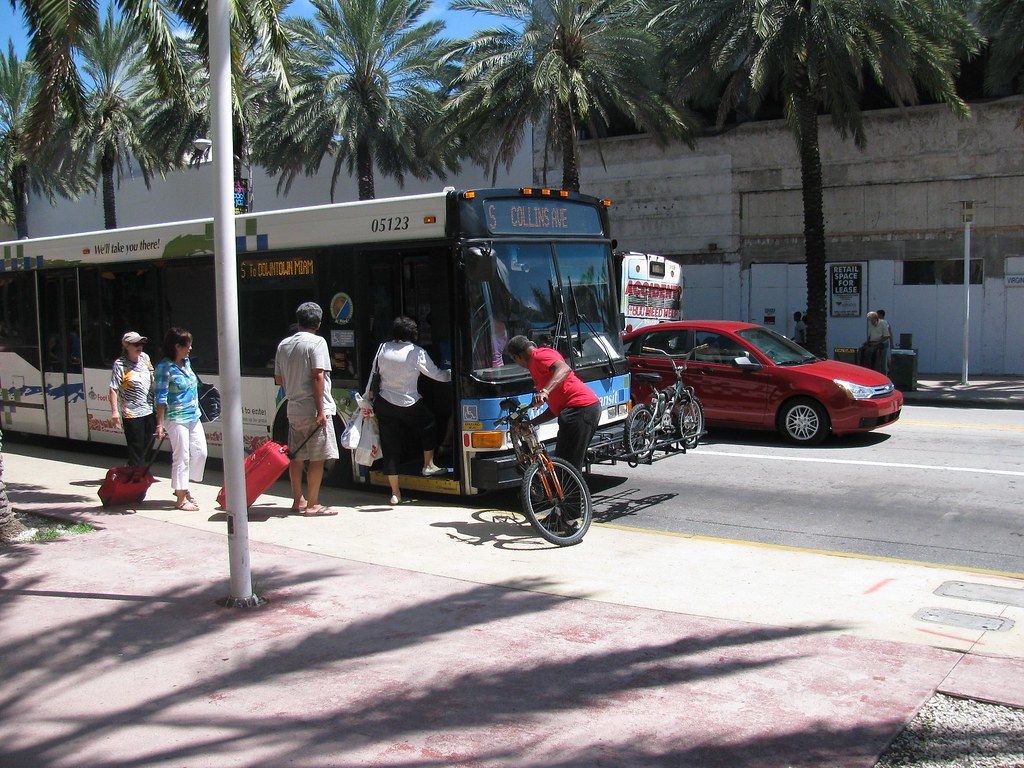 A bus passing shops near Lincoln Road in Miami Beach