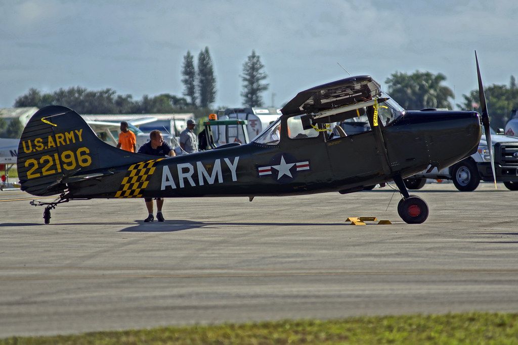 A vintage Army liaison plane parked at North Perry Airport