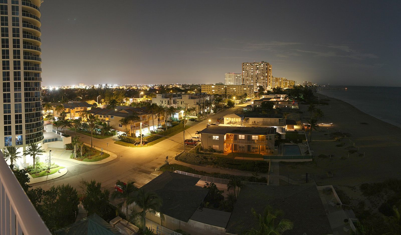 Briney Avenue and the Pompano Beach waterfront lit up at night