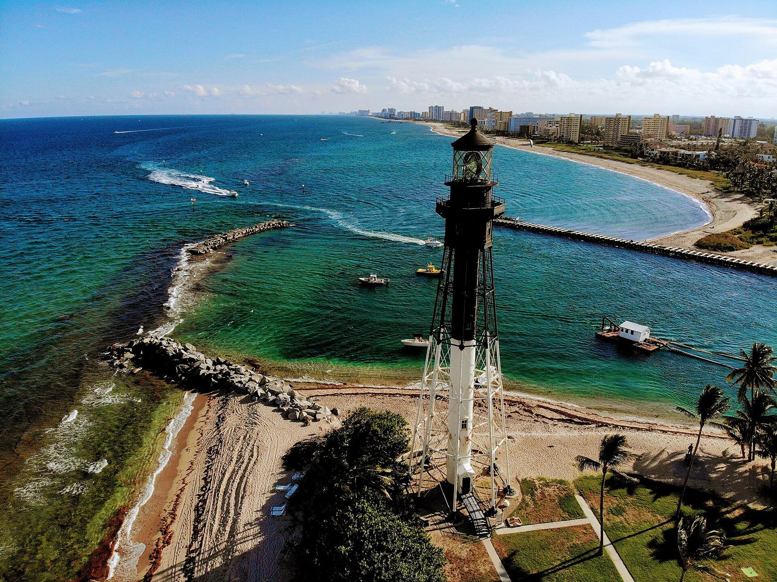 Aerial view of the Hillsboro Inlet Lighthouse and the inlet shoreline