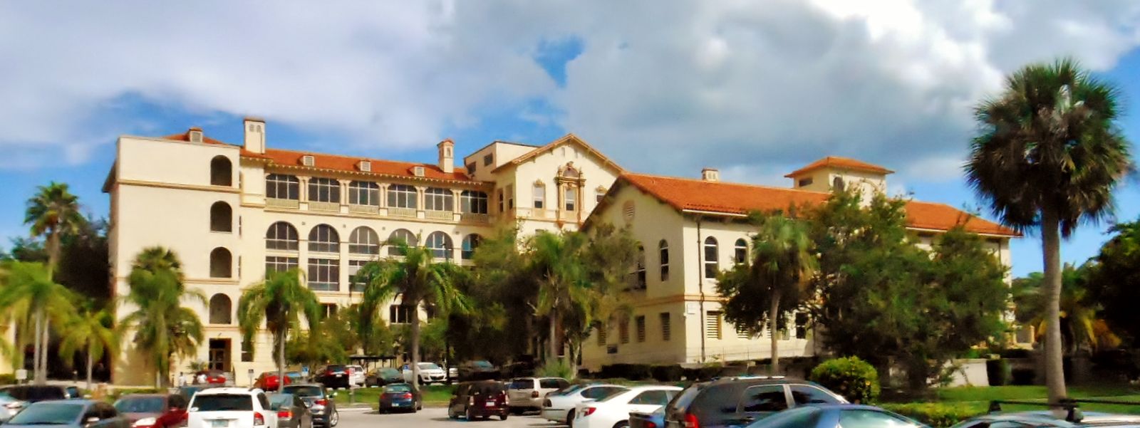 Buildings of the Bay Pines Veterans Administration Home and Hospital Historic District among palm trees near St. Petersburg