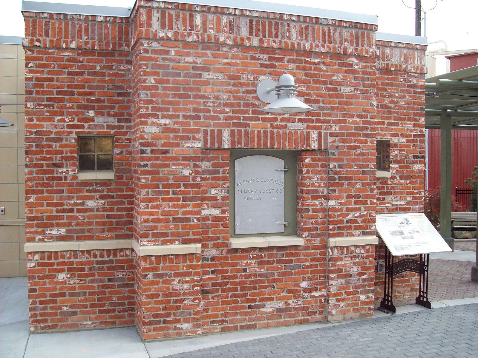 Part of the red brick Meridian Heritage Pavilion in the Meridian City Hall Plaza