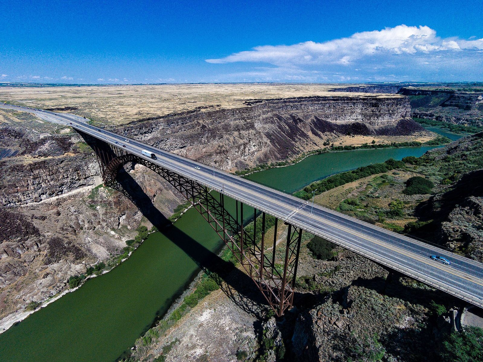 The Perrine Bridge crossing the Snake River Canyon at Twin Falls, seen from the air with the green river far below