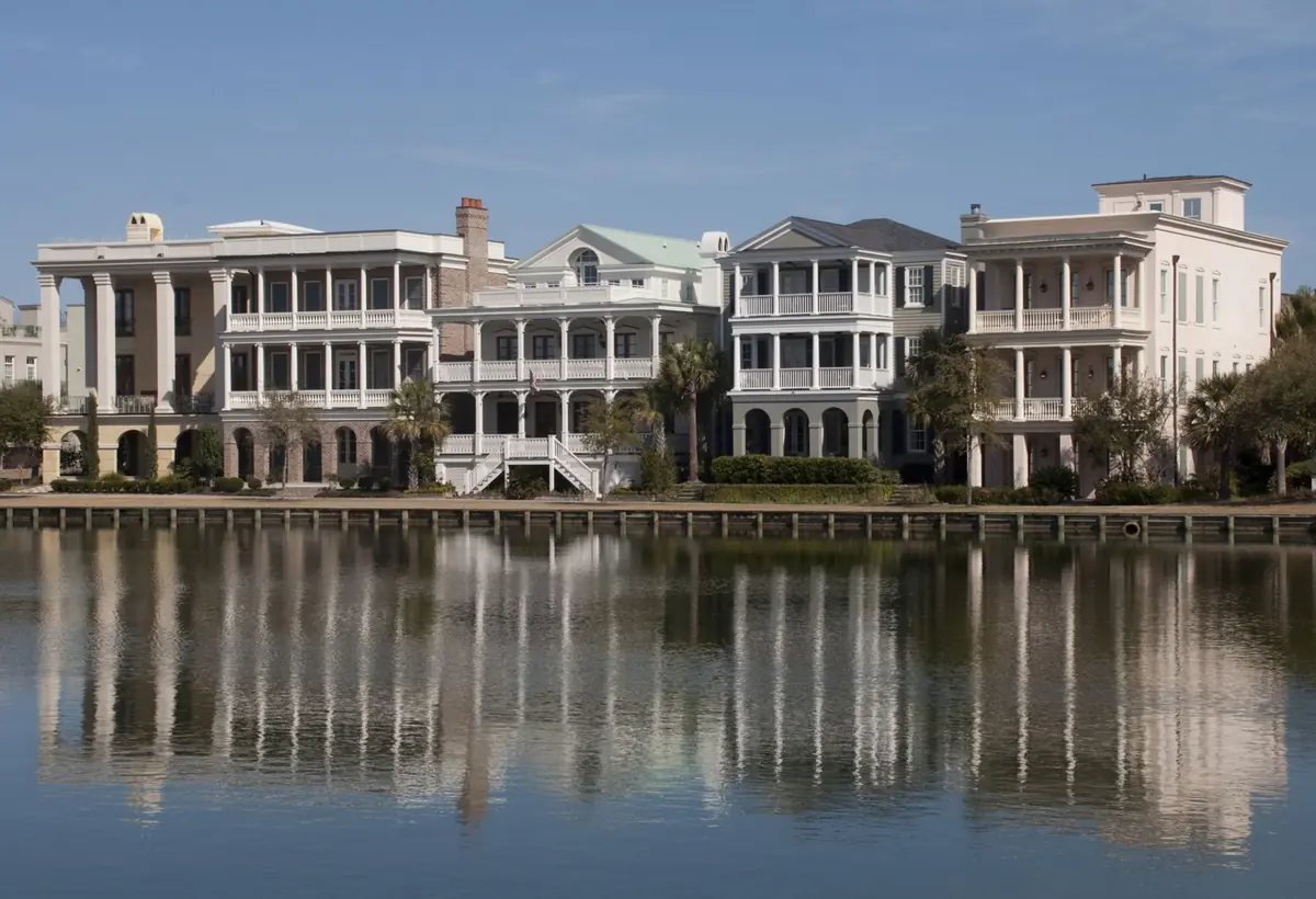 Homes in the I'On neighborhood of Mount Pleasant reflected in still water