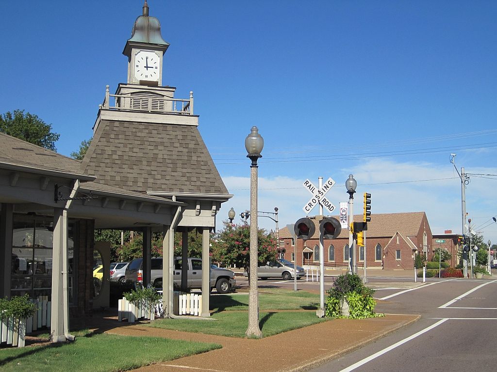 Clock tower pavilion and railroad crossing at Bartlett's historic town square