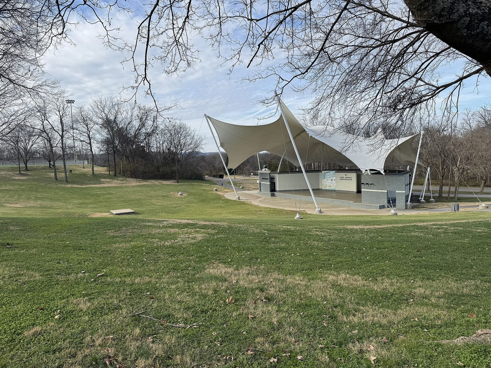 The white tent roof of the Eddy Arnold Amphitheater in Crockett Park