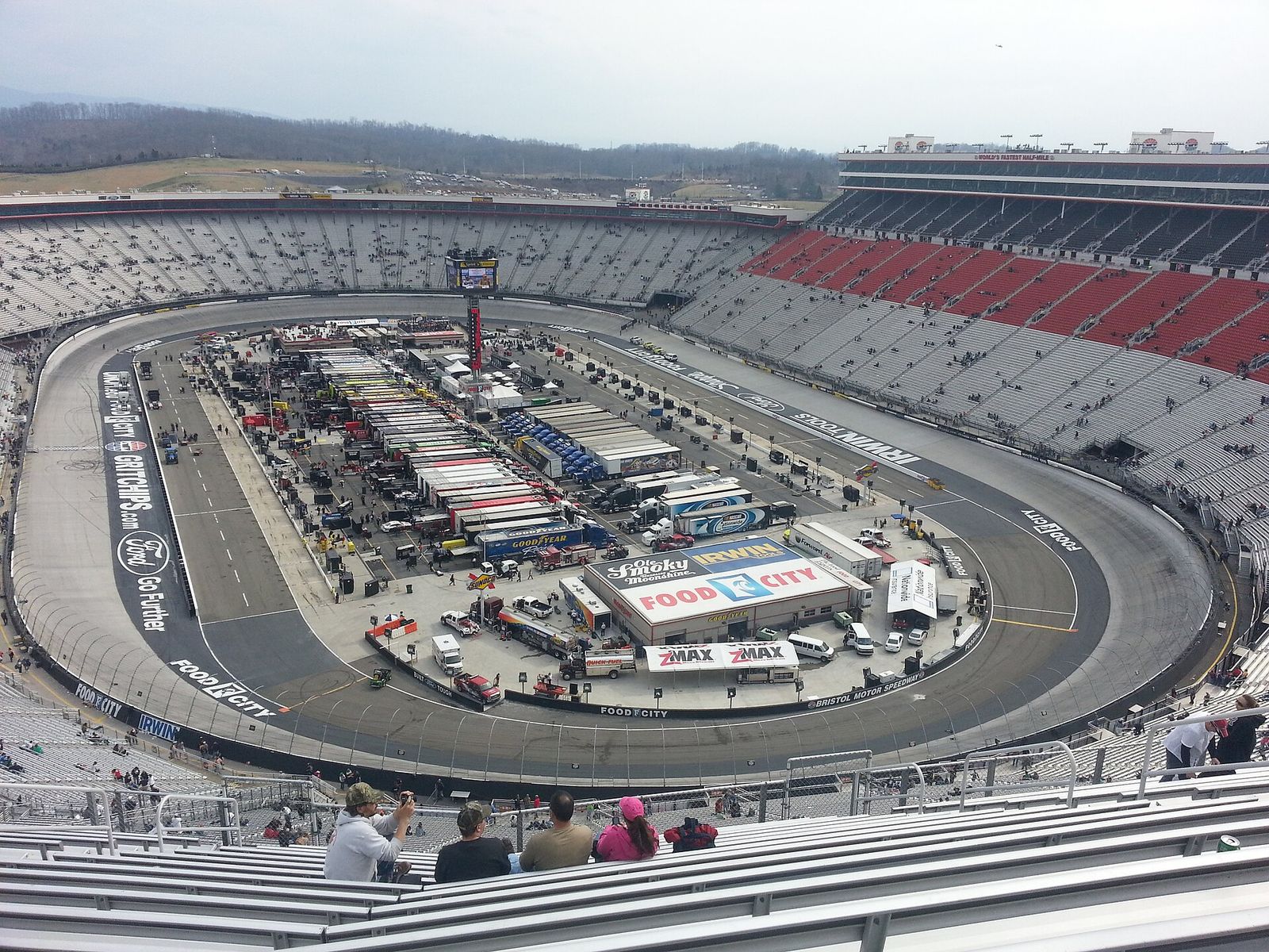The infield and steep banked oval of Bristol Motor Speedway seen from the stands