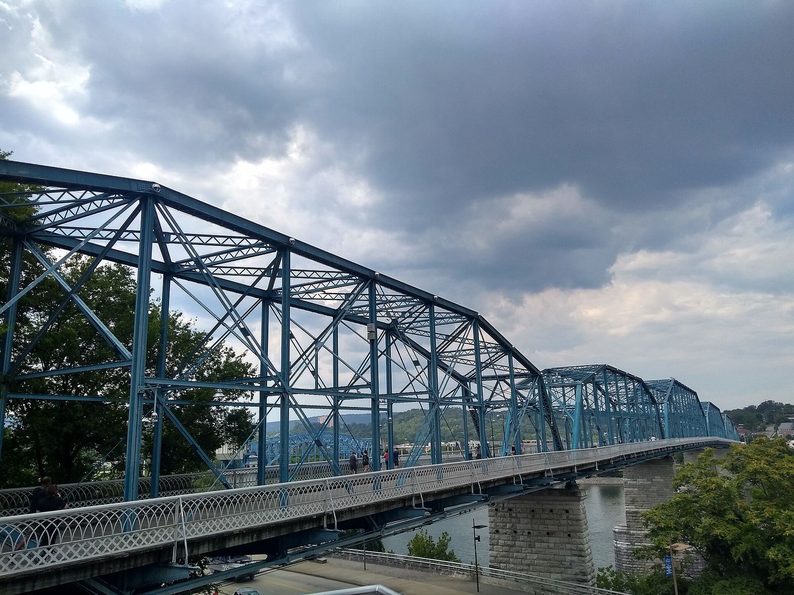 The blue steel trusses of the Walnut Street Bridge over the Tennessee River