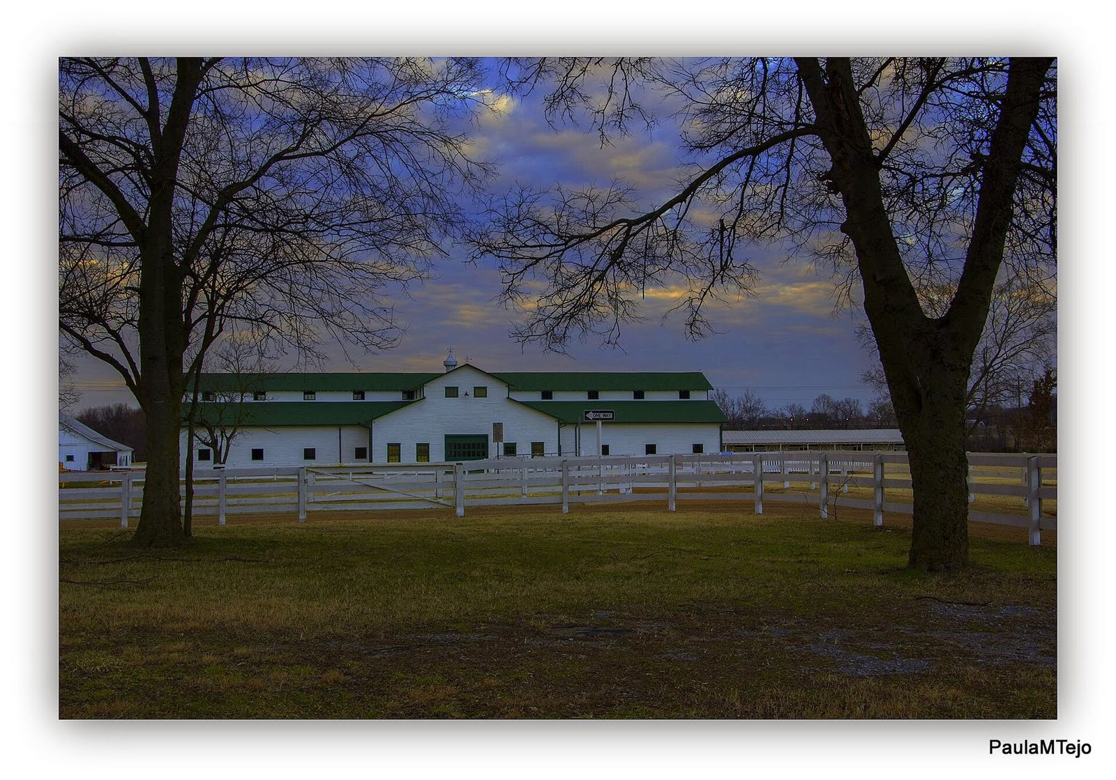 The white barn and fencing at The Park at Harlinsdale Farm