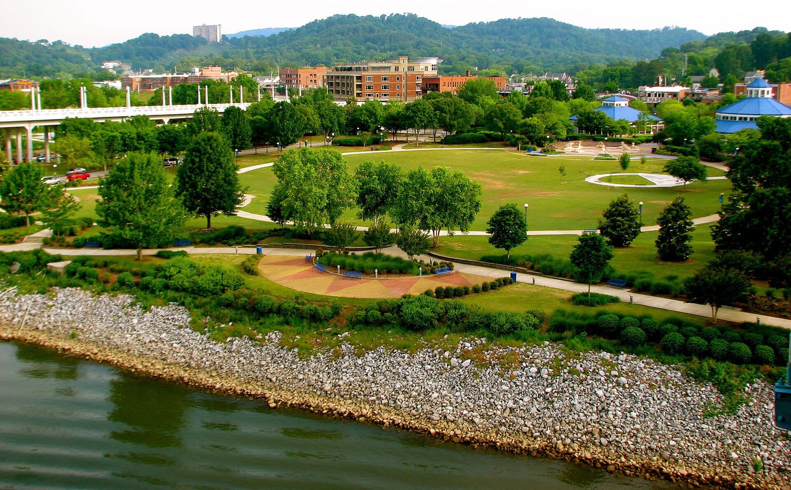 The lawns and walking paths of Coolidge Park on the north shore of the Tennessee River in Chattanooga