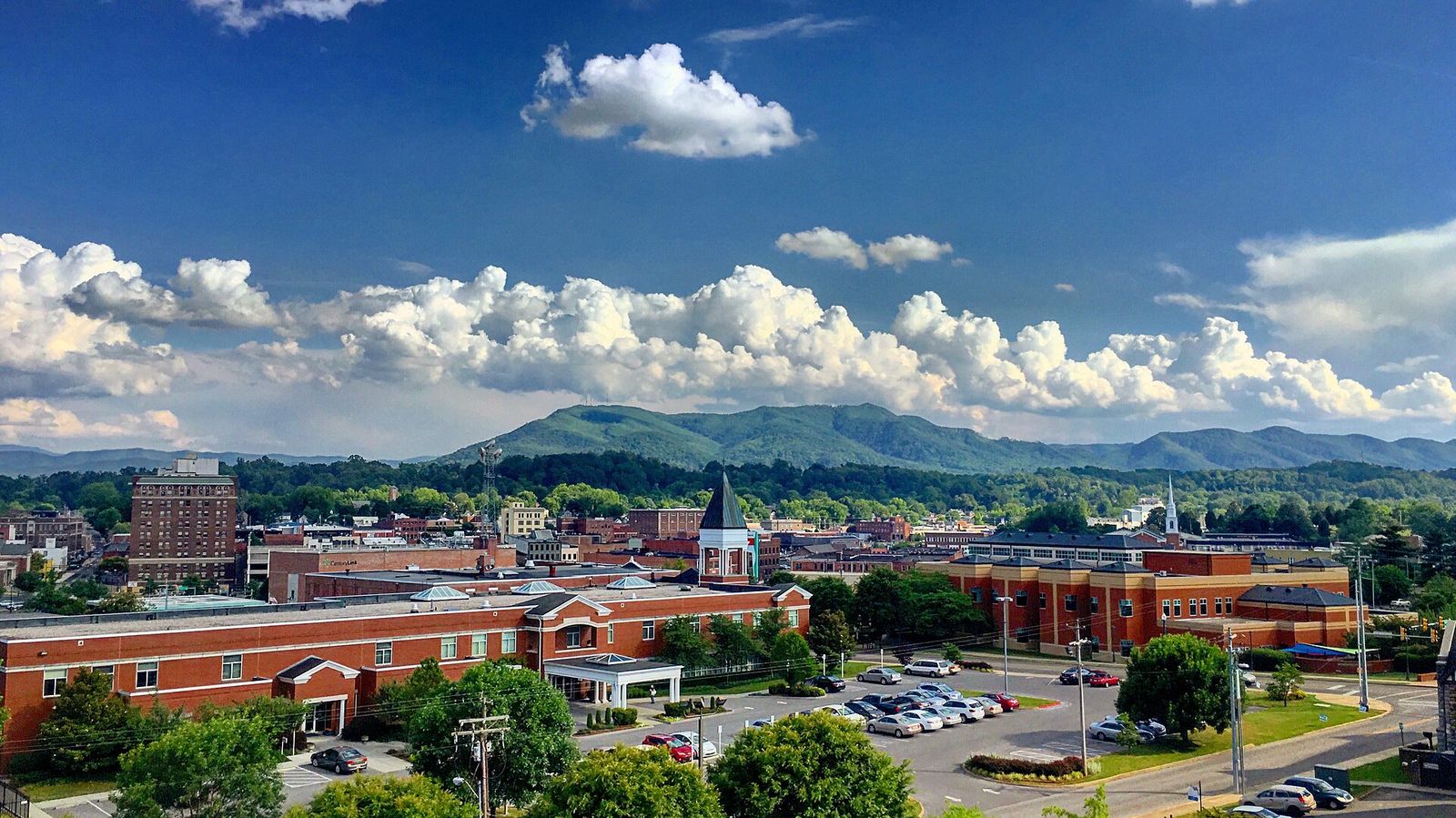 Johnson City spread across its valley with mountains behind