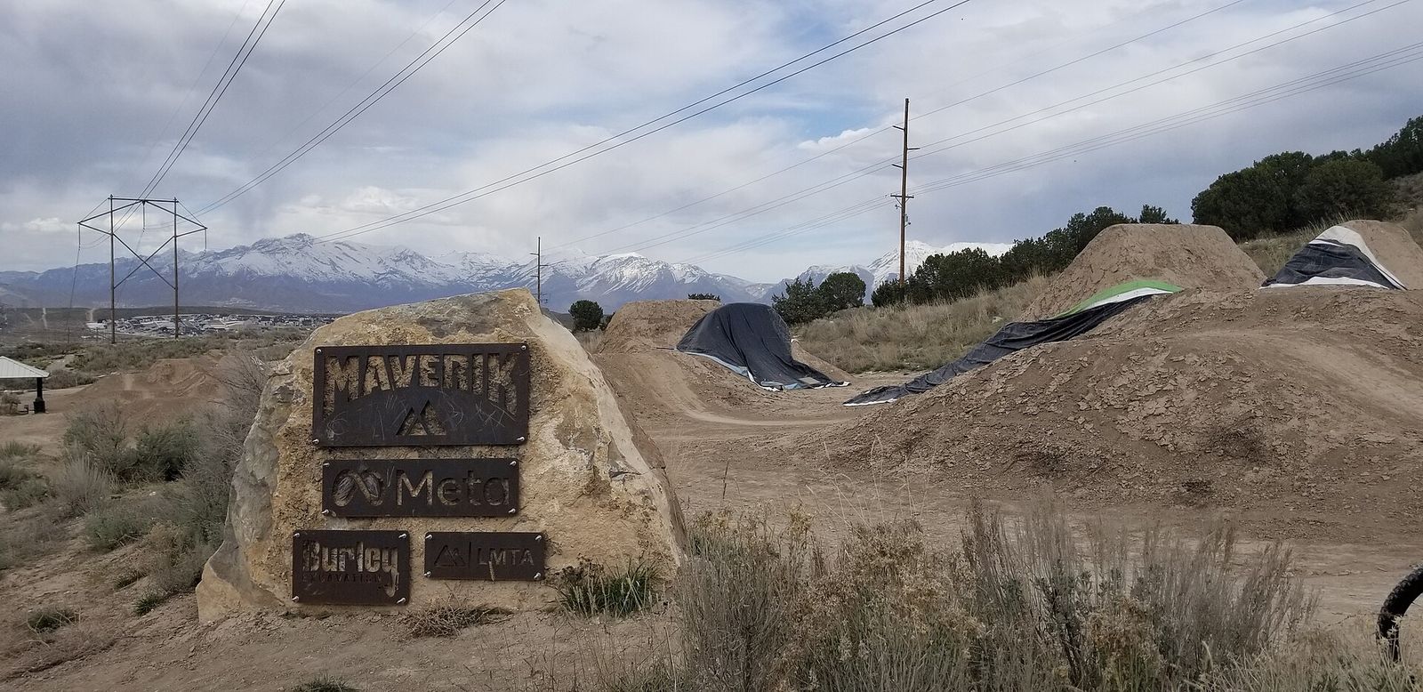 Dirt jumps and the sponsor rock at Mountain Ranch Bike Park in Eagle Mountain