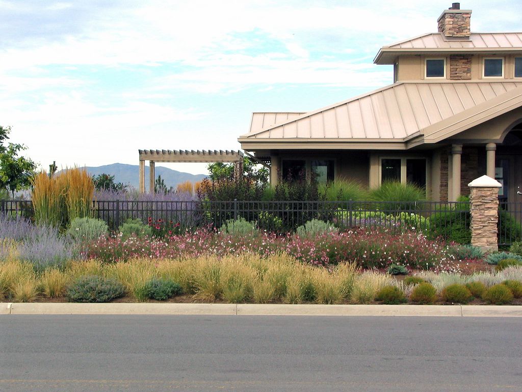 The Utah House at the Utah Botanical Center in Kaysville, behind beds of drought-tolerant plants and grasses