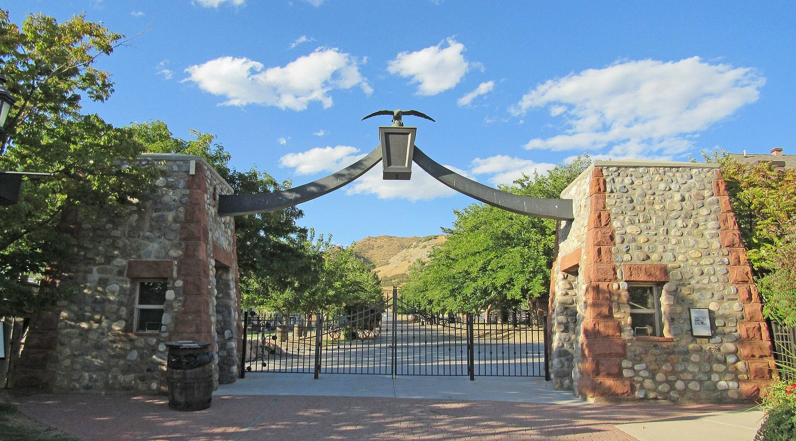 The Eagle Gate replica at This Is the Place Heritage Park, with an eagle above a stone and timber arch