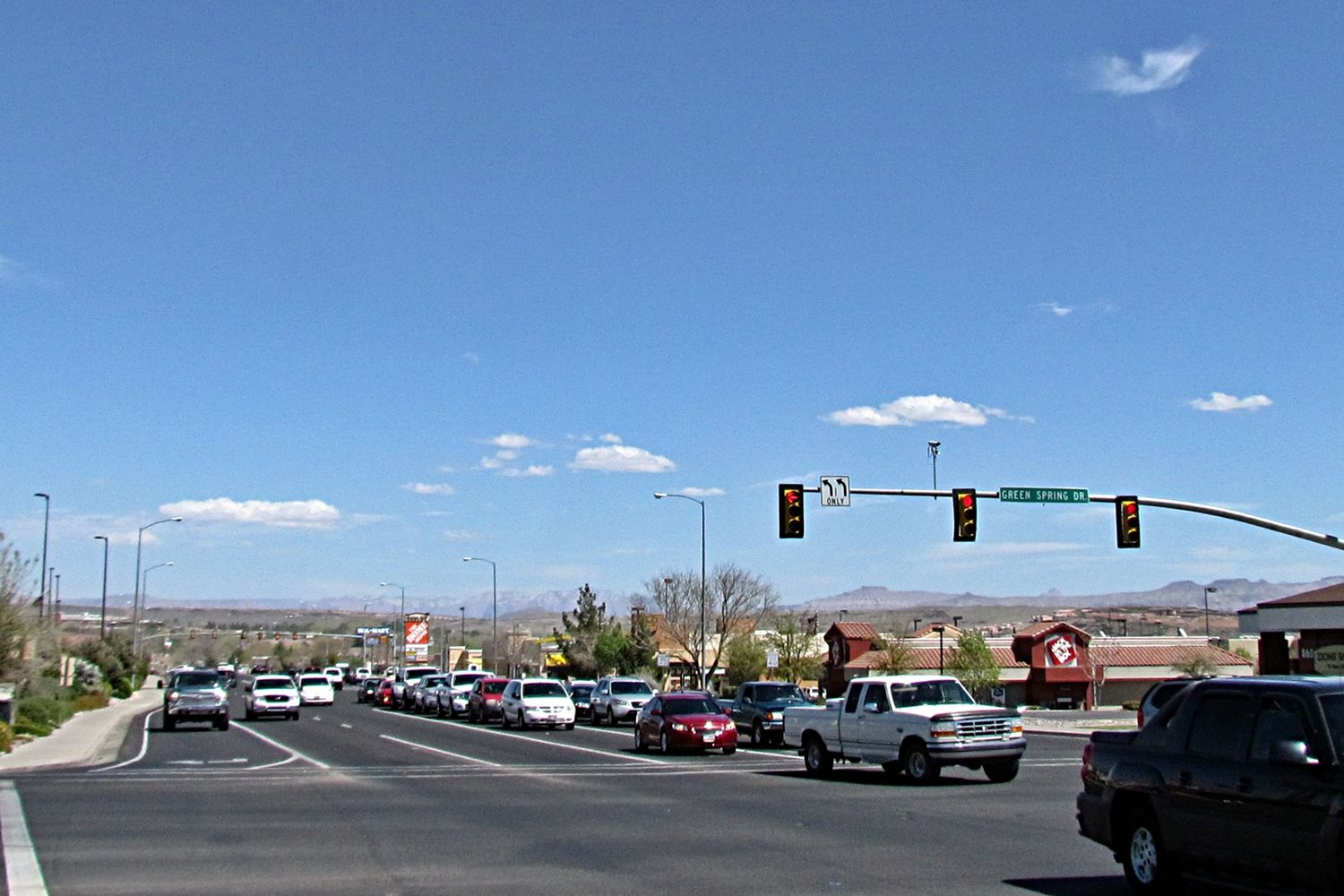 Cars on Telegraph Street in Washington, looking east under a clear blue sky