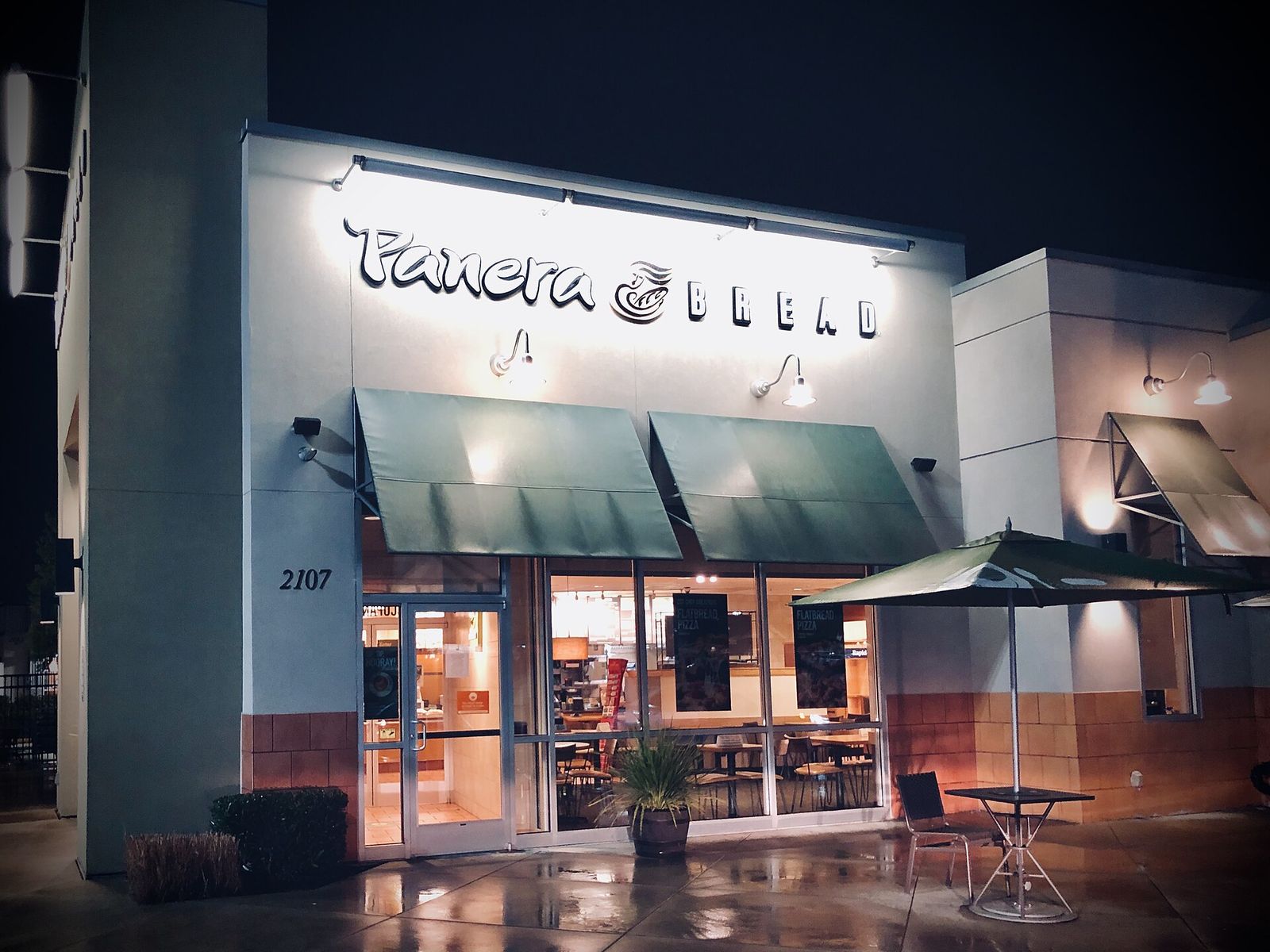 A lit storefront at The Commons at Federal Way