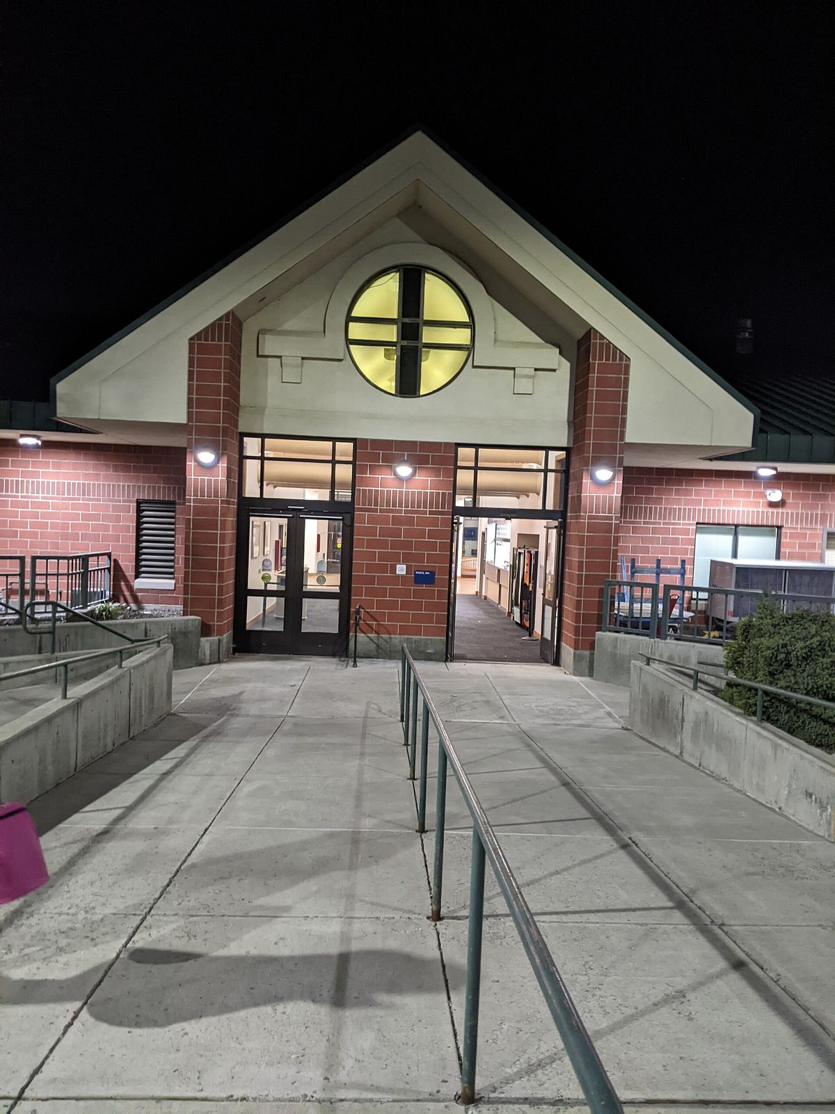 The front entrance of the Pasco intermodal train station at night
