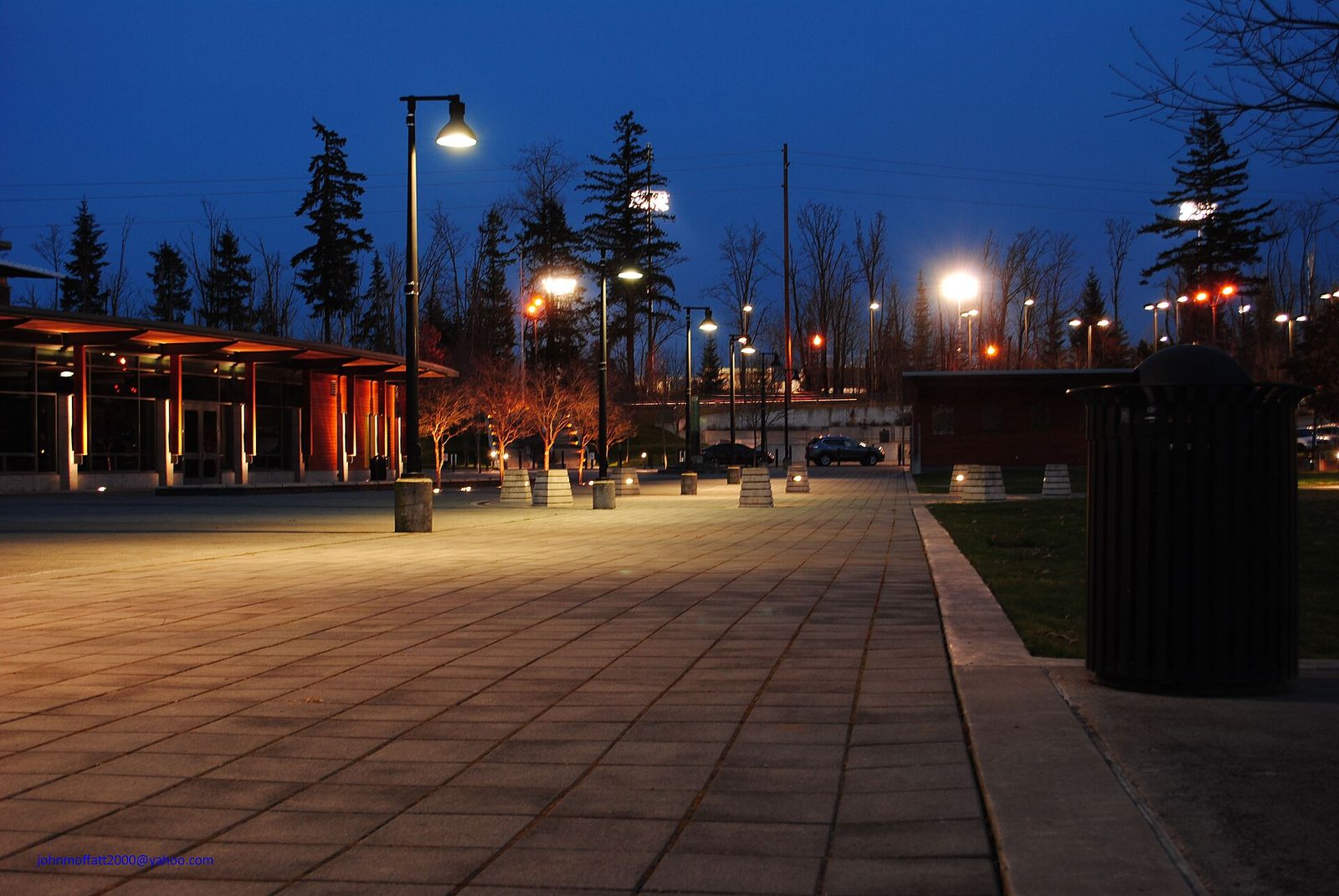 Sammamish City Hall and its plaza lit up at dusk
