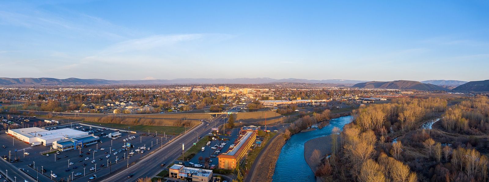 The Yakima River at sunrise with the city beside it